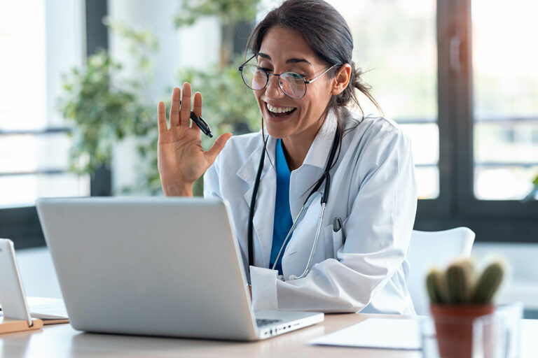 female doctor talking on computer meeting